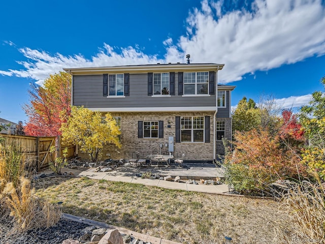 view of front of property featuring a patio area