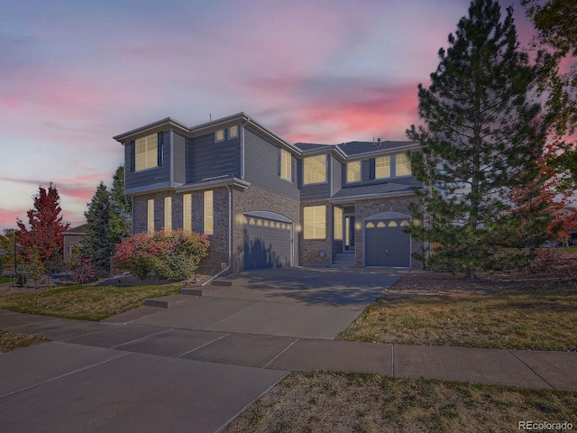 view of front of property featuring a garage