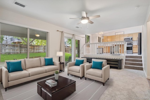 living room with ceiling fan