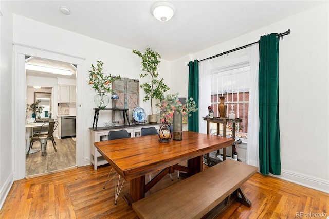 3016 N Franklin St, Denver, CO 80205 - dining area with baseboards and light wood-type flooring