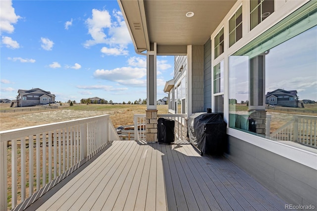 wooden deck with area for grilling