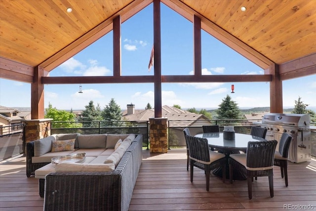 6170 Falcon Ridge Ln, Morrison, CO 80465 - wooden terrace with an outdoor living space, outdoor dining space, and an outdoor kitchen