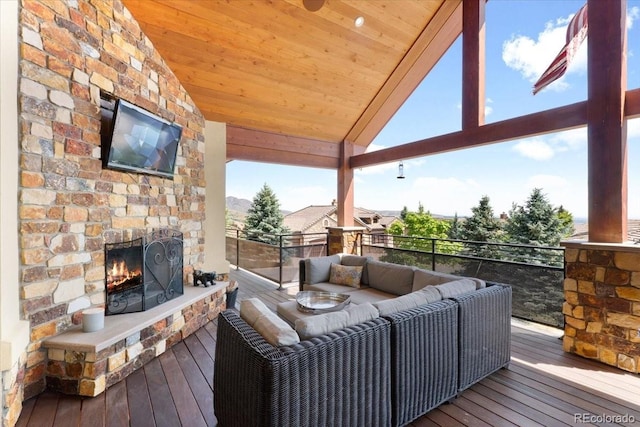 6170 Falcon Ridge Ln, Morrison, CO 80465 - deck featuring an outdoor living space with a fireplace