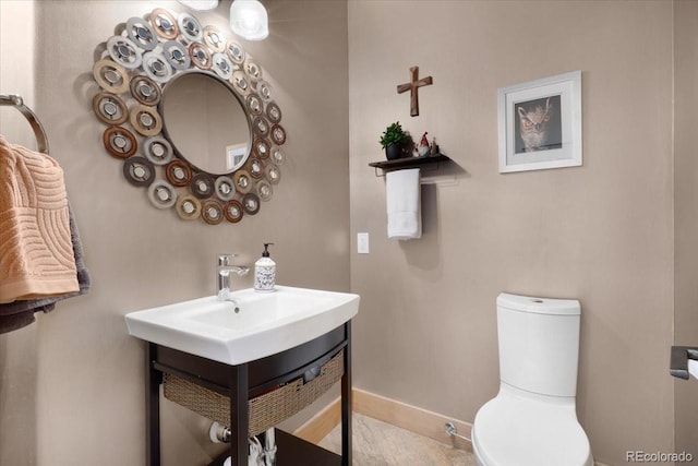 6170 Falcon Ridge Ln, Morrison, CO 80465 - bathroom featuring toilet and vanity