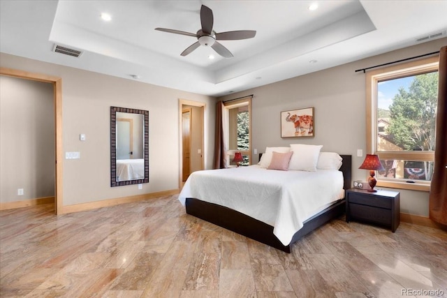 6170 Falcon Ridge Ln, Morrison, CO 80465 - bedroom with a tray ceiling, recessed lighting, and a ceiling fan
