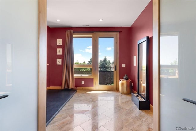 6170 Falcon Ridge Ln, Morrison, CO 80465 - foyer featuring plenty of natural light and tile patterned floors