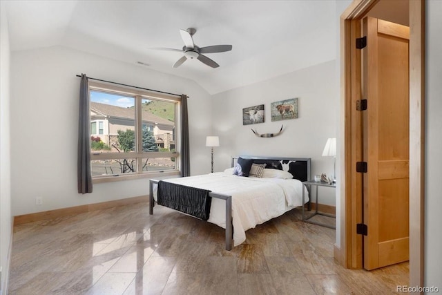 6170 Falcon Ridge Ln, Morrison, CO 80465 - bedroom with lofted ceiling, a ceiling fan, and light wood-type flooring