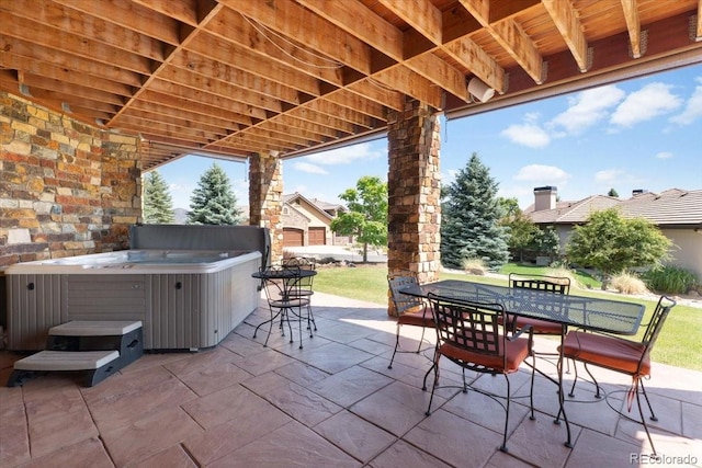 6170 Falcon Ridge Ln, Morrison, CO 80465 - view of patio featuring a hot tub and outdoor dining space