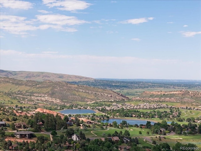 6170 Falcon Ridge Ln, Morrison, CO 80465 - drone / aerial view of a water and mountain view