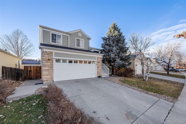 front of property with a garage