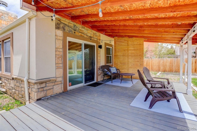 deck featuring fence
