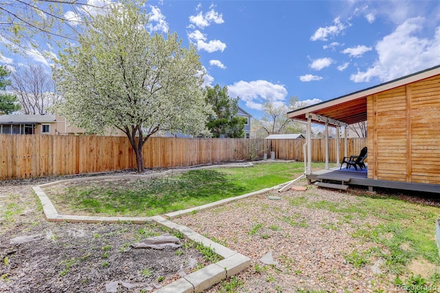 view of yard featuring a wooden deck
