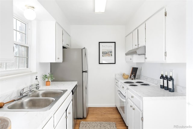 kitchen featuring white cabinets, dishwasher, white electric range, under cabinet range hood, and a sink