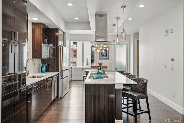 3444 Navajo St Unit 10, Denver, CO 80211 - kitchen with a sink, modern cabinets, a kitchen bar, a center island, and island exhaust hood