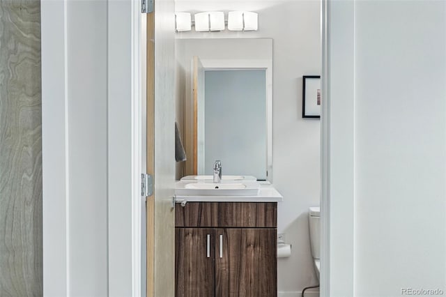 3444 Navajo St Unit 10, Denver, CO 80211 - bathroom featuring toilet and vanity