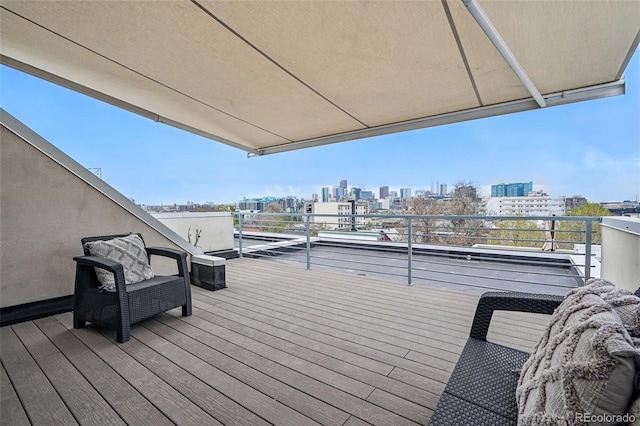 3444 Navajo St Unit 10, Denver, CO 80211 - wooden deck featuring a skyline view