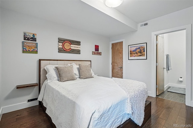 3444 Navajo St Unit 10, Denver, CO 80211 - bedroom with wood finished floors, baseboards, and connected bathroom