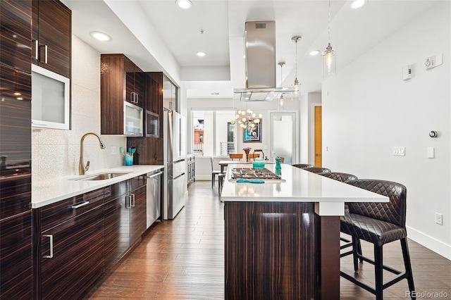 3444 Navajo St Unit 10, Denver, CO 80211 - kitchen with a sink, appliances with stainless steel finishes, modern cabinets, a breakfast bar, and light countertops