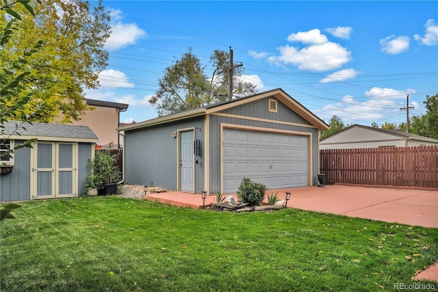 garage with a yard