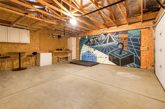 garage featuring white refrigerator