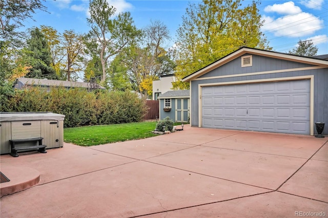 garage featuring a yard