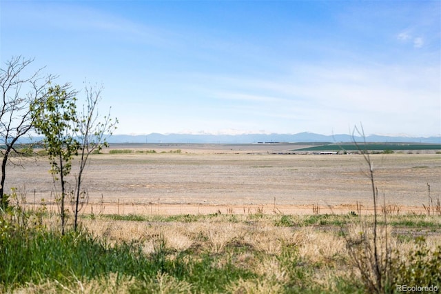 water view featuring rural landscape and a mountain backdrop
