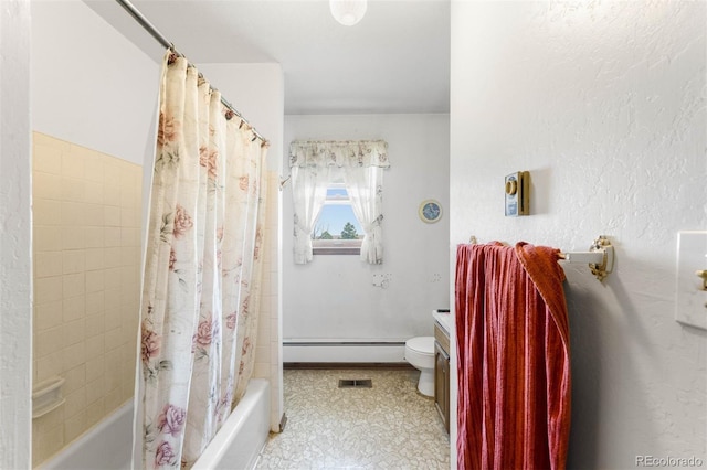 full bathroom featuring baseboard heating, shower / bath combo, toilet, and vanity