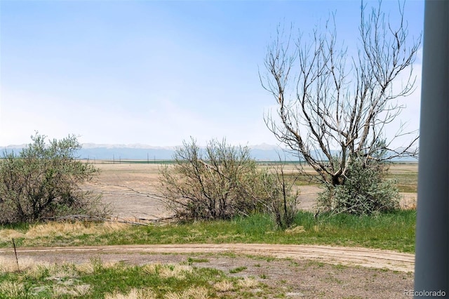 water view with rural landscape and a mountain backdrop