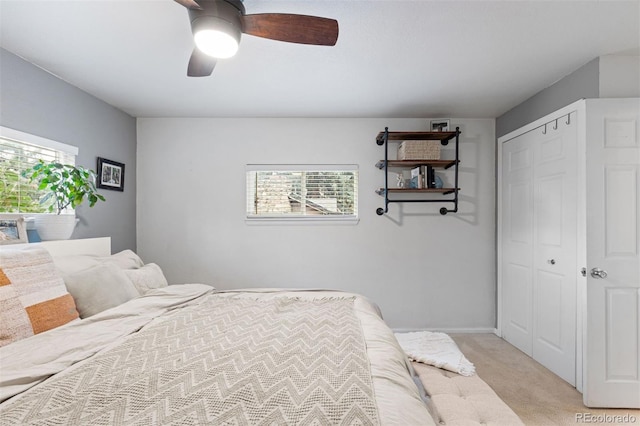 26095 Columbine Trl, Kittredge, CO 80457 - bedroom featuring a ceiling fan, light carpet, and a closet