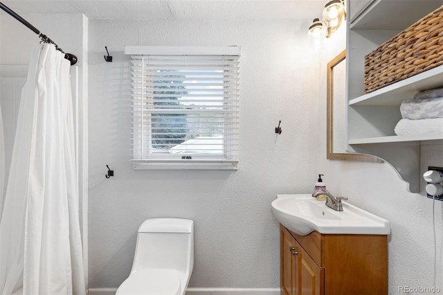 26095 Columbine Trl, Kittredge, CO 80457 - bathroom featuring toilet, vanity, and a shower with curtain