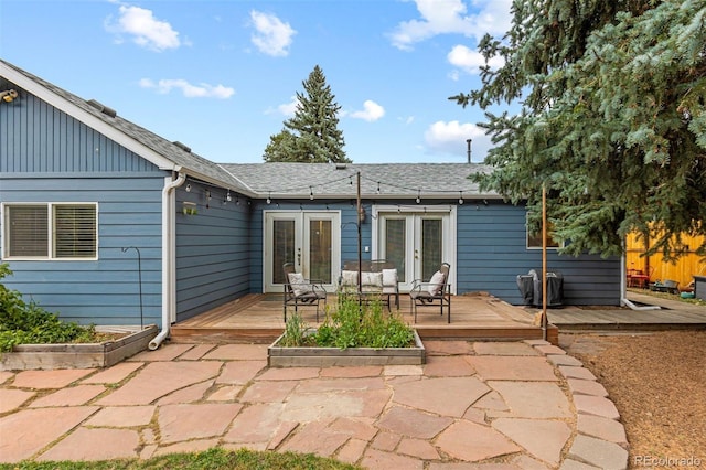 26095 Columbine Trl, Kittredge, CO 80457 - rear view of property featuring a wooden deck, french doors, and roof with shingles