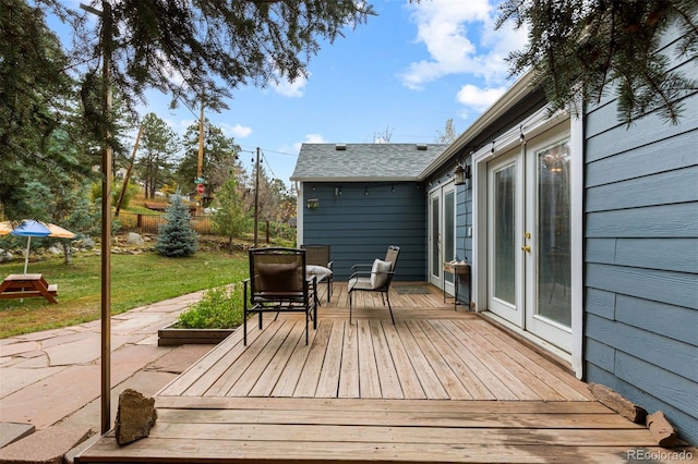 26095 Columbine Trl, Kittredge, CO 80457 - wooden deck with a patio and a yard
