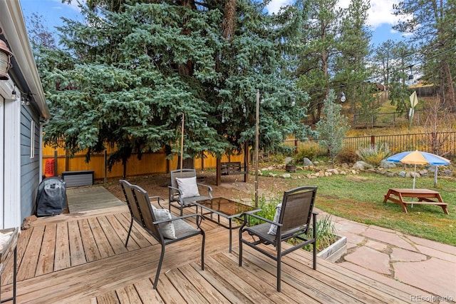 26095 Columbine Trl, Kittredge, CO 80457 - wooden deck with a lawn and fence