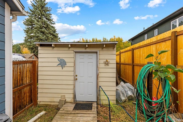 26095 Columbine Trl, Kittredge, CO 80457 - view of shed with a fenced backyard