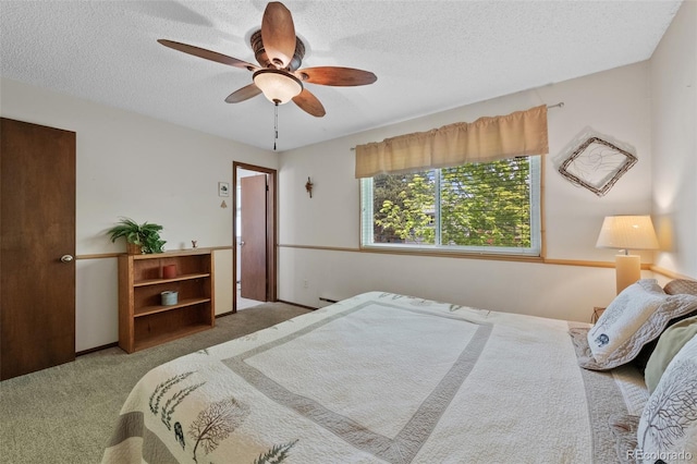 4525 S Cole Ct, Morrison, CO 80465 - bedroom featuring carpet, a textured ceiling, and ceiling fan