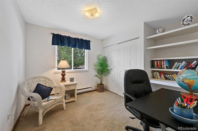 4525 S Cole Ct, Morrison, CO 80465 - carpeted home office featuring a baseboard heating unit and a textured ceiling