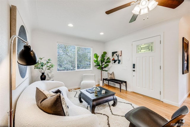 1765 Xenia St, Denver, CO 80220 - living room with light wood finished floors, recessed lighting, baseboards, and ceiling fan