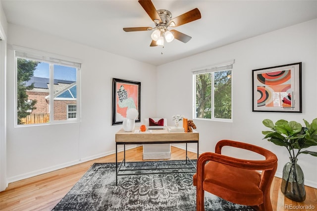 1765 Xenia St, Denver, CO 80220 - home office featuring wood finished floors, a ceiling fan, and baseboards