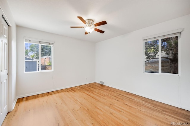 1765 Xenia St, Denver, CO 80220 - spare room with wood finished floors, baseboards, and ceiling fan