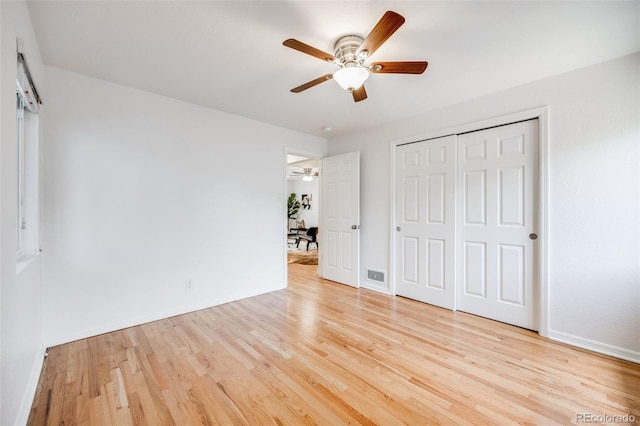 1765 Xenia St, Denver, CO 80220 - unfurnished bedroom featuring wood finished floors, a closet, and baseboards
