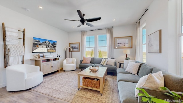 689 Olive St, Broomfield, CO 80023 - living area featuring ceiling fan, recessed lighting, and wood finished floors