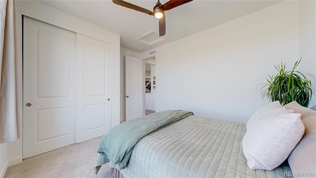 689 Olive St, Broomfield, CO 80023 - carpeted bedroom featuring a closet, ceiling fan, attic access, and visible vents