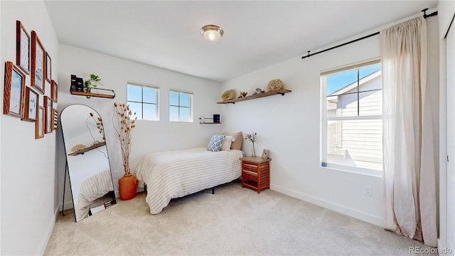 689 Olive St, Broomfield, CO 80023 - carpeted bedroom with baseboards