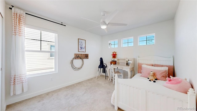 689 Olive St, Broomfield, CO 80023 - bedroom with baseboards, ceiling fan, and light colored carpet