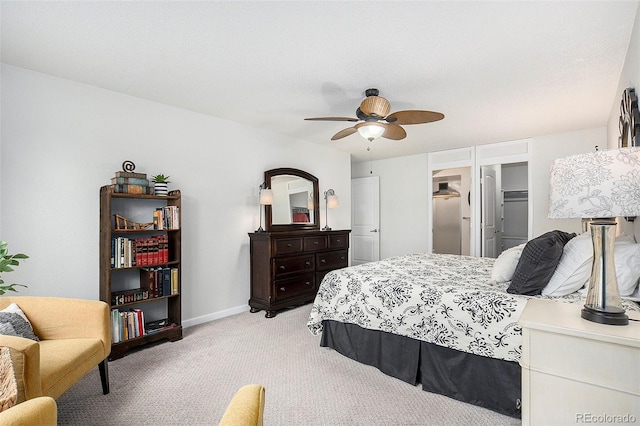 bedroom with light carpet, a ceiling fan, and baseboards