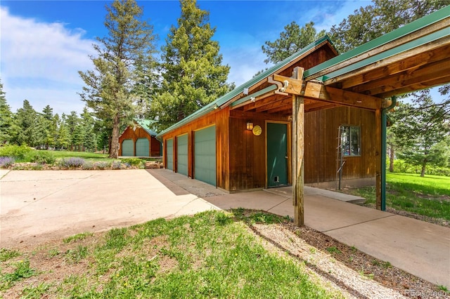 8834 Deiffendeffer Rd, Rye, CO 81069 - view of home's exterior featuring an outbuilding and a garage