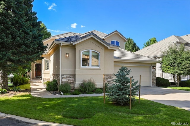 10793 Alcott Way, Denver, CO 80234 - view of front facade featuring stone siding, an attached garage, driveway, a front lawn, and a tile roof