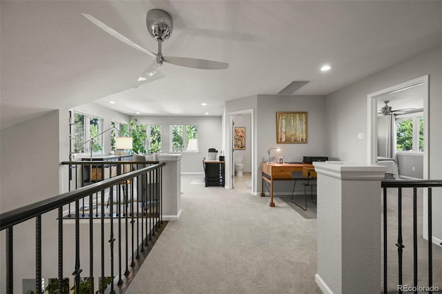 10793 Alcott Way, Denver, CO 80234 - corridor featuring an upstairs landing, recessed lighting, light colored carpet, and a desk