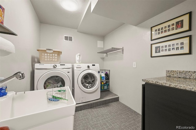 10793 Alcott Way, Denver, CO 80234 - washroom with carpet floors and separate washer and dryer