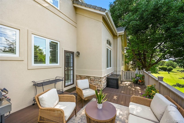 10793 Alcott Way, Denver, CO 80234 - wooden deck with an outdoor hangout area